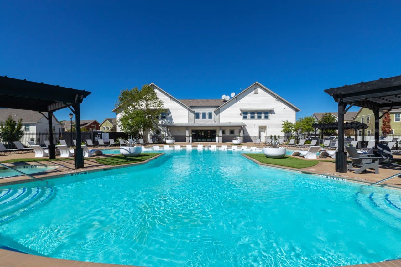 the-collective-at-columbia-apartments-near-the-university-of-missouri-pool-seating-clubhouse